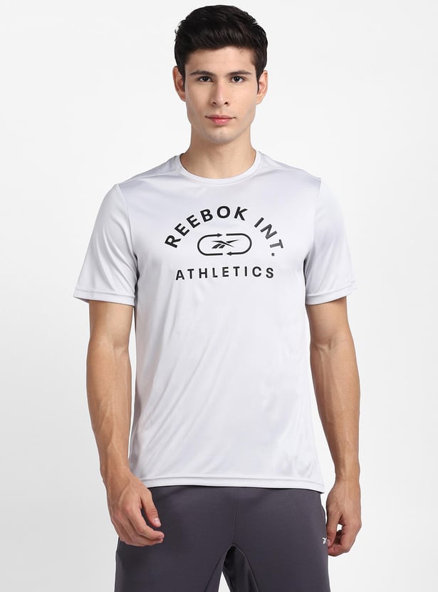 Buy REEBOK Men Printed Sports T-shirt from Reebok at just INR