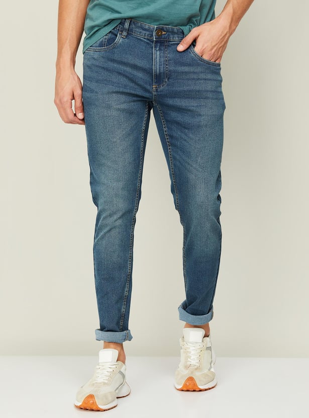 Buy FORCA Men Stonewashed Slim Fit Jeans from Forca at just INR