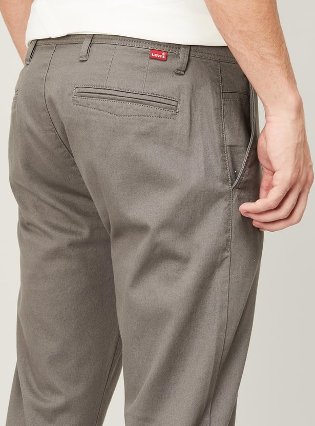 Buy LEVI'S Men Solid Slim Tapered Fit Casual Trousers from Levi's