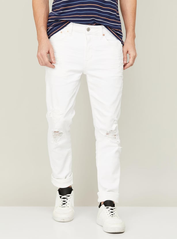 Buy AMERICAN EAGLE Men Solid Distressed Skinny Fit Jeans from