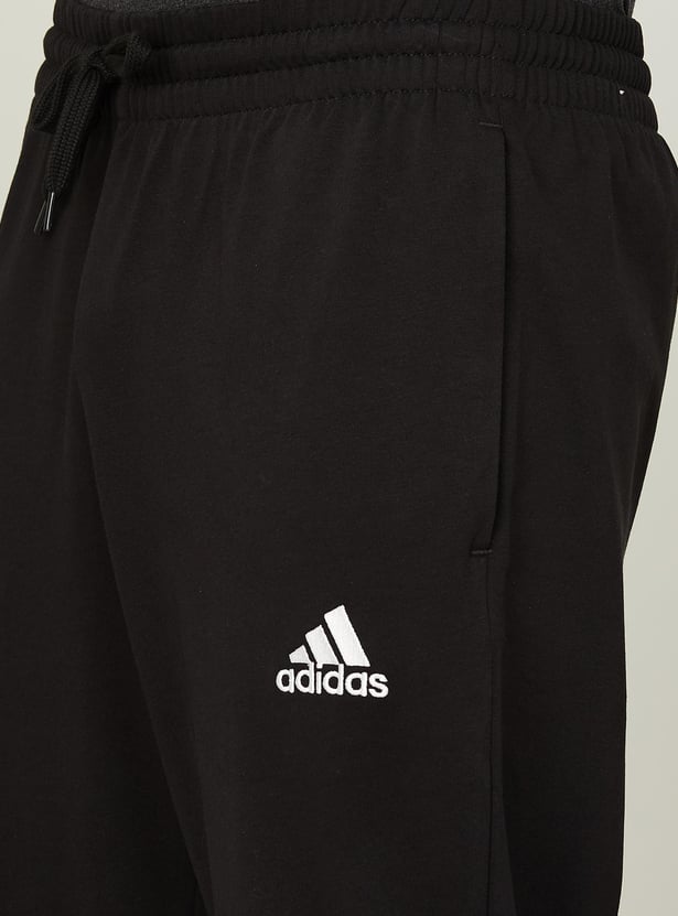 Buy ADIDAS Men Printed Sports Track Pants from Adidas at just INR