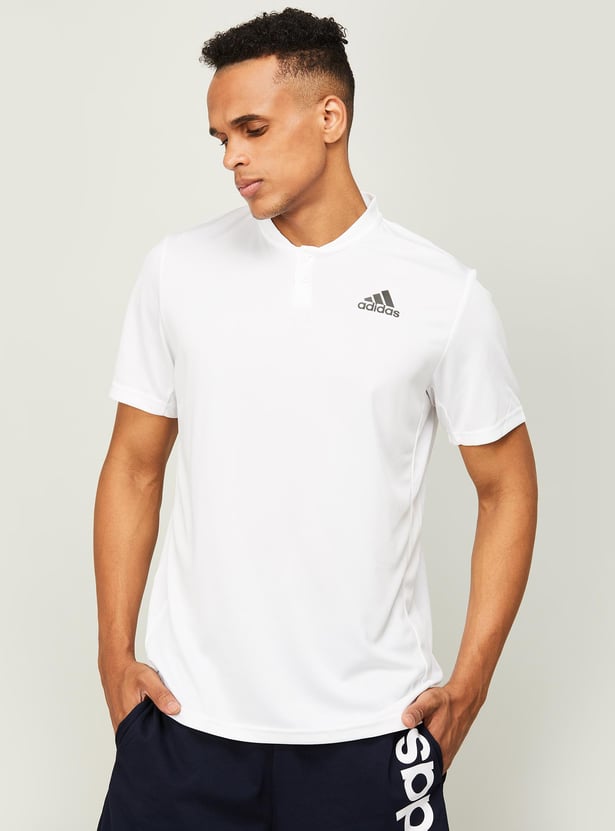 Buy ADIDAS Men Solid Half Sleeves Regular Fit Sports Henley T shirt from Adidas at just INR 1999.0