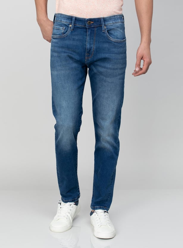 Buy FLYING MACHINE Men Slim Tapered Faded Jeans from Flying