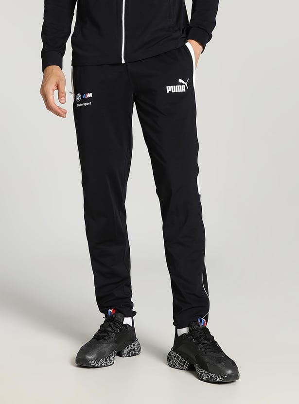 Buy PUMA Men Solid Slim Fit Track Pants from PUMA at just INR