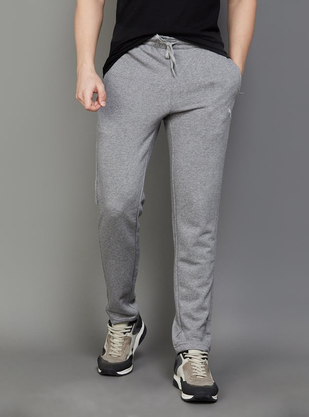 Buy PUMA Men Solid Slim Fit Track Pants from PUMA at just INR