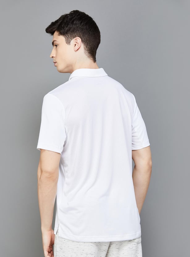 ADIDAS Men Solid Polo T-shirt