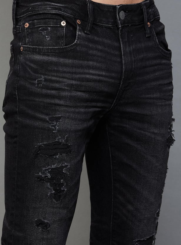 Buy AMERICAN EAGLE Men Solid Skinny Fit Distressed Jeans from