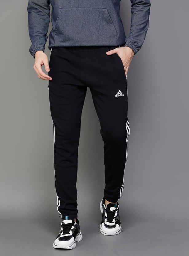 Buy ADIDAS Men Three Striped Track Pants from Adidas at just INR 3299.0