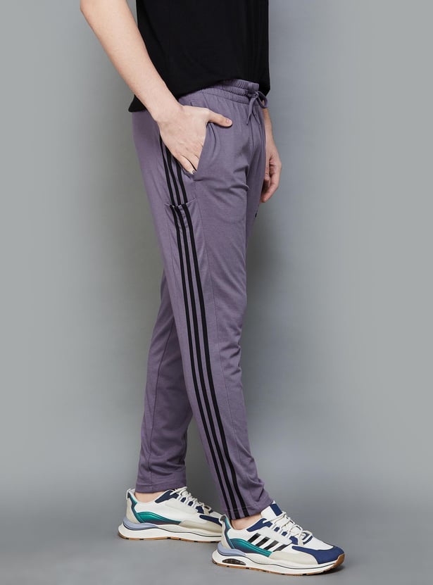 Buy ADIDAS Men Panelled Regular Fit Sports Track Pants from Adidas at just INR 3799.0