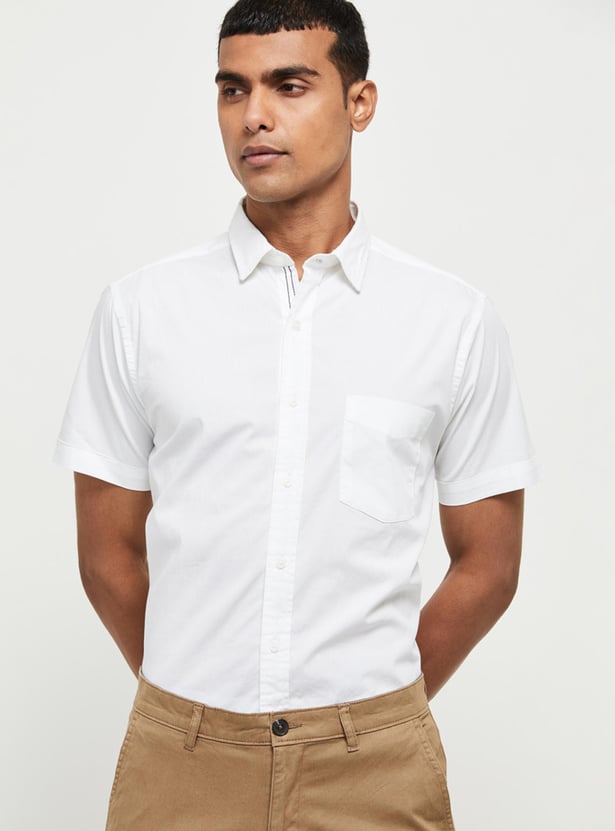 Buy Men Solid Smart Casual Shirt Online at just Rs. 899.…