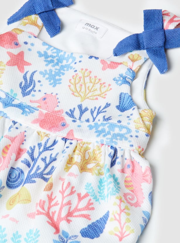 Girls Printed Sleeveles Fit and Flare Dress with Bow Details