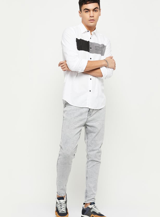 Buy Men Faded Carrot Fit Jeans Online at just