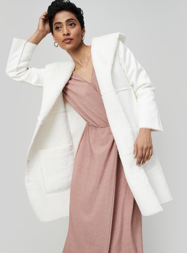 Buy Women Solid Reversible Faux Fur Coat Online at just Rs. 3499.0