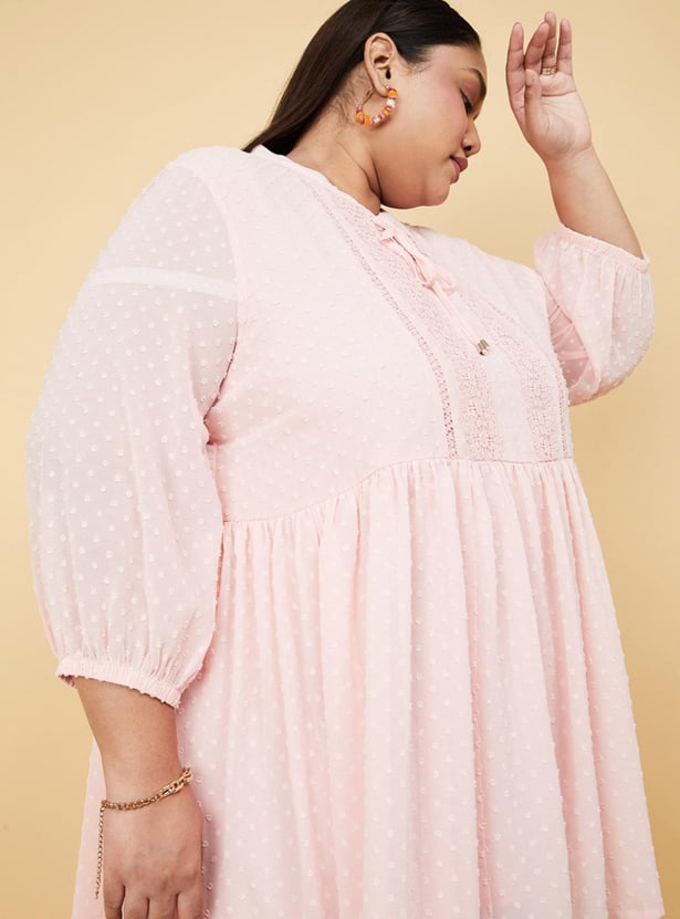 Buy Women Textured Three-Quarter Sleeves Tunic Top Online at just