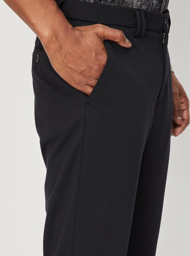 Men Solid Knit Carrot Fit Trousers