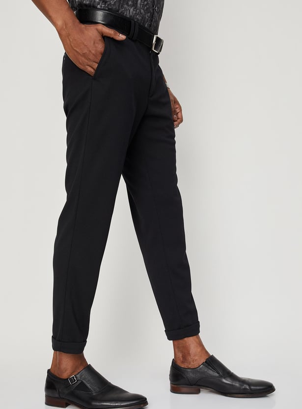 Men Solid Knit Carrot Fit Trousers