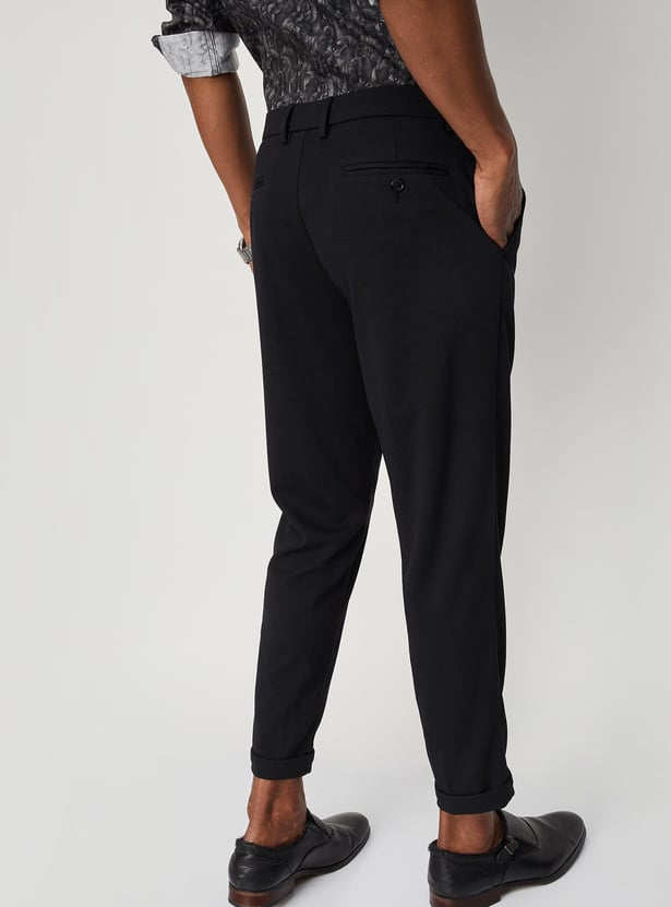 Men Solid Knit Carrot Fit Trousers