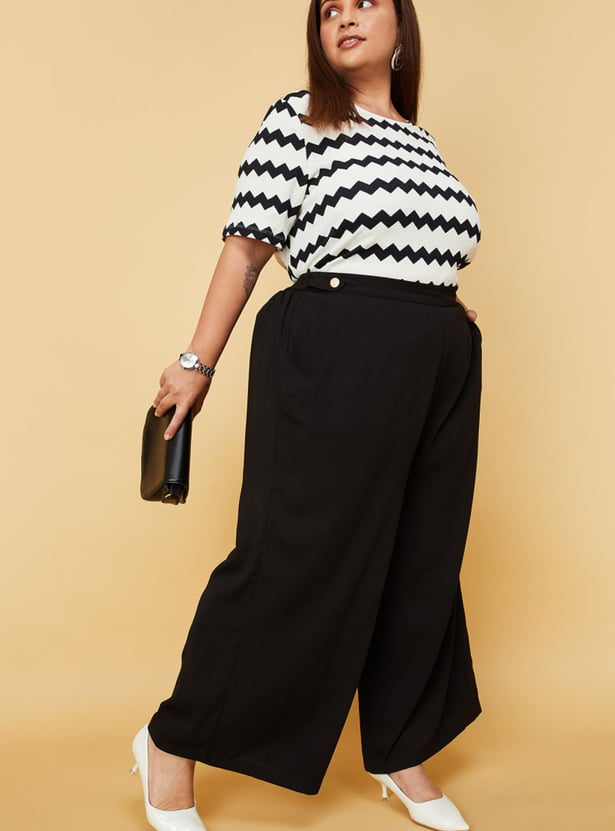 Women Solid Flared Trousers