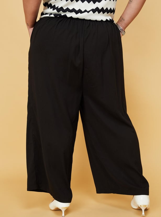Women Solid Flared Trousers