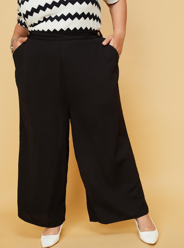 Women Solid Flared Trousers