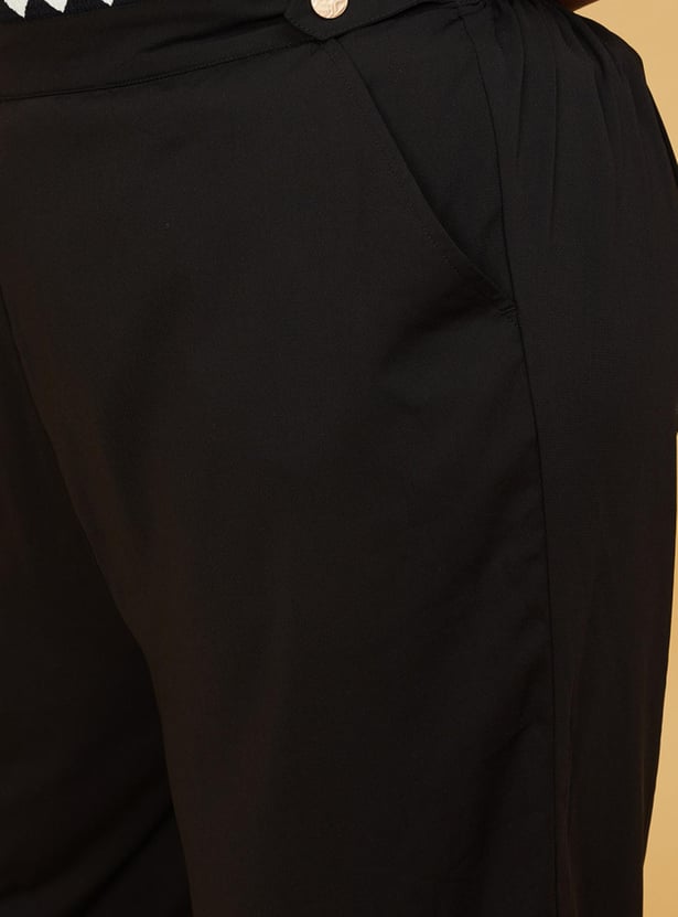 Women Solid Flared Trousers