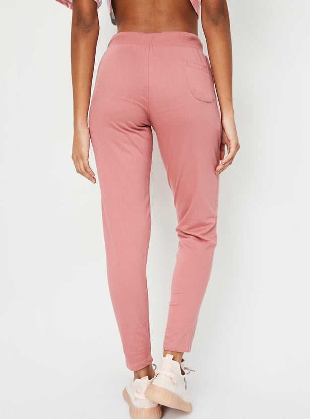 Buy Women Solid Sports Track Pants Online at just