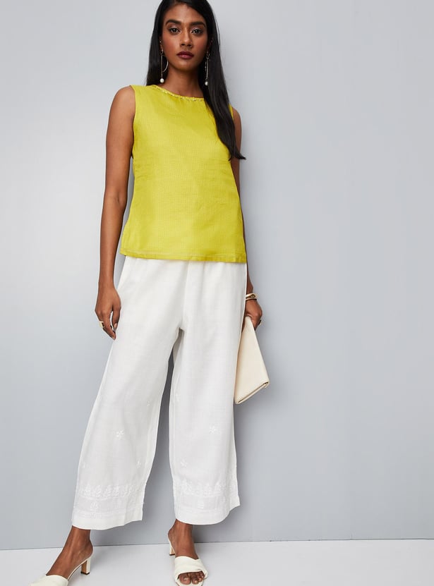 Women Solid Palazzos with Schiffli Detail
