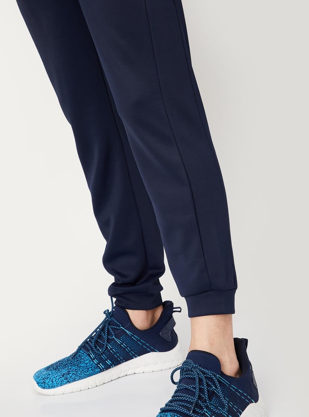 Buy Men Solid Elasticated Slim Fit Active Joggers Online at just