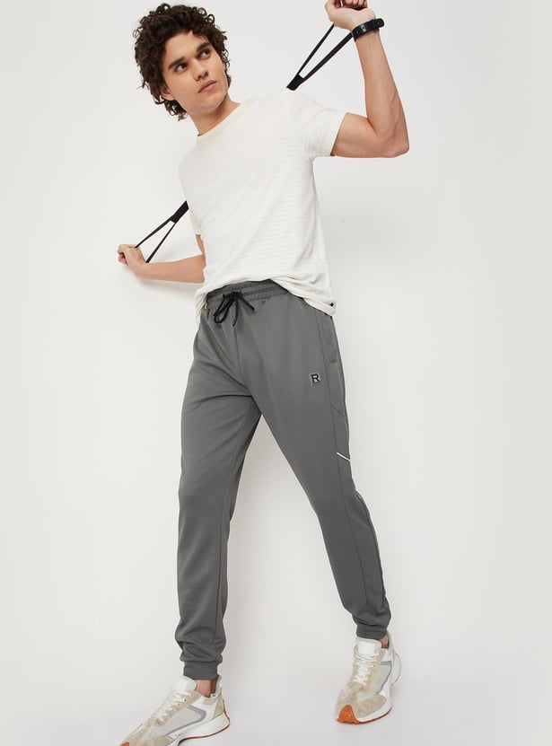 Men Solid Elasticated Slim Fit Active Joggers