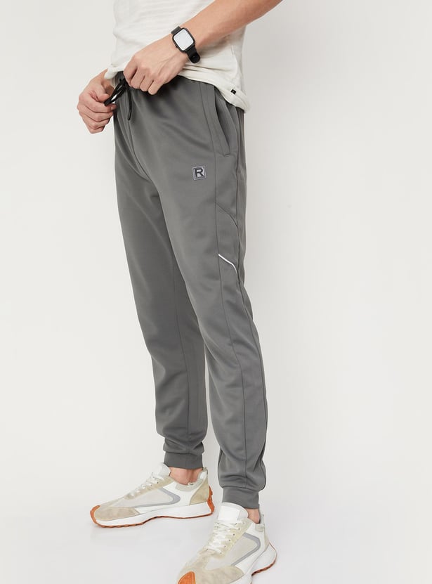 Men Solid Elasticated Slim Fit Active Joggers