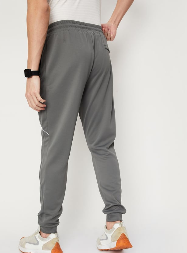 Men Solid Elasticated Slim Fit Active Joggers