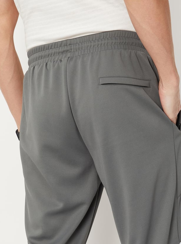 Men Solid Elasticated Slim Fit Active Joggers