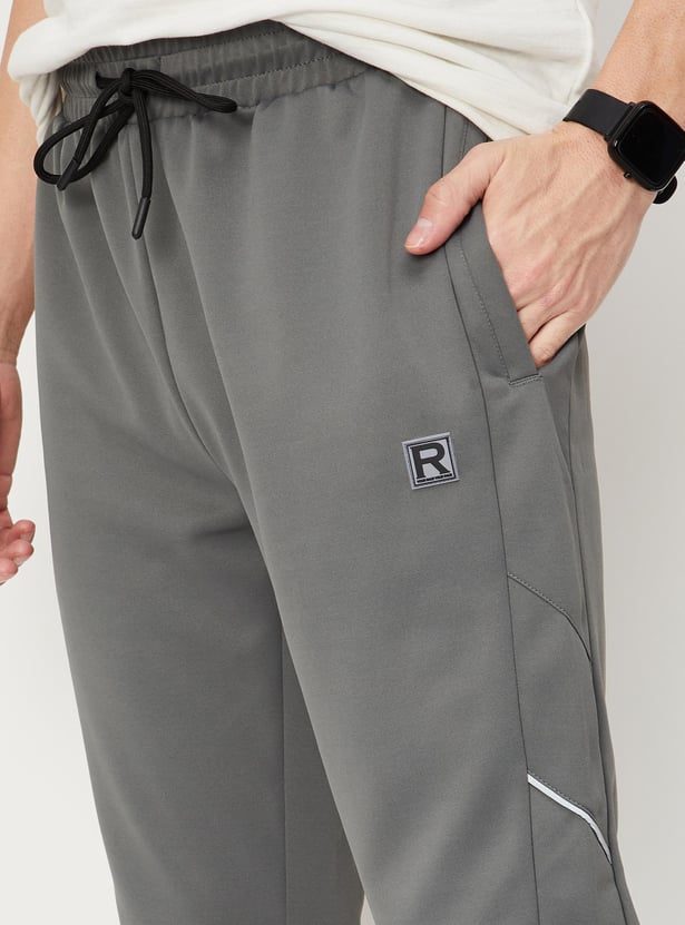 Men Solid Elasticated Slim Fit Active Joggers