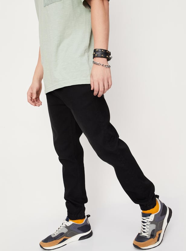 Men Solid Carrot Fit Jeans