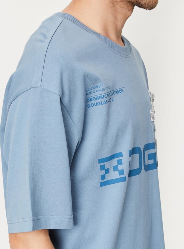 Men Typographic Printed Oversized T-shirt