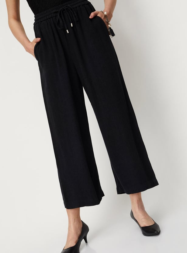 Women Solid Woven Relaxed Fit Trousers