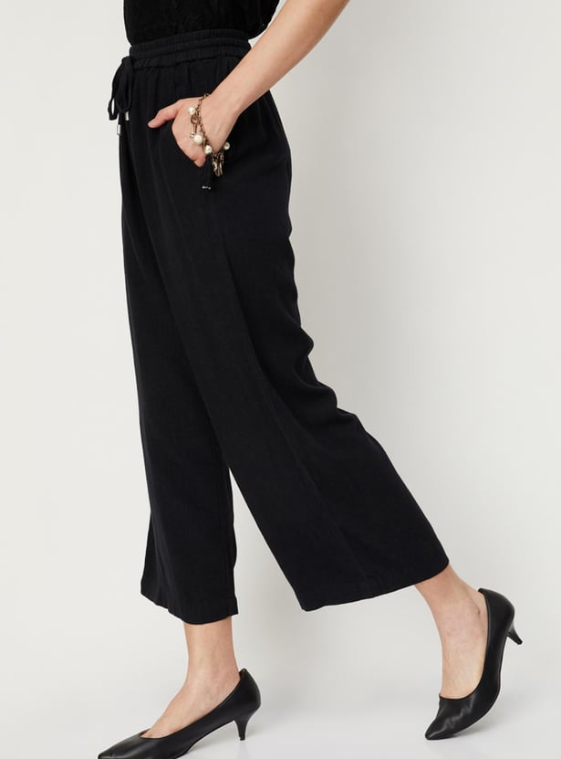 Women Solid Woven Relaxed Fit Trousers