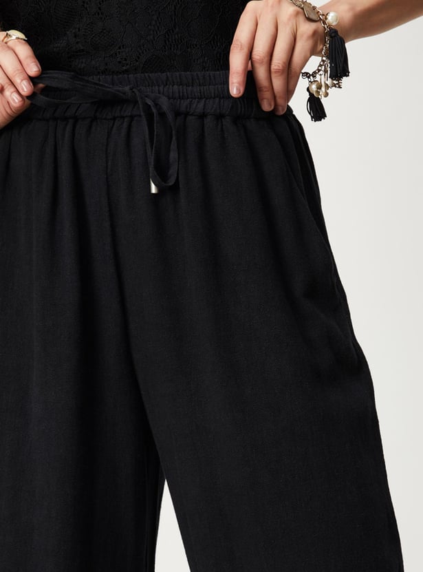 Women Solid Woven Relaxed Fit Trousers