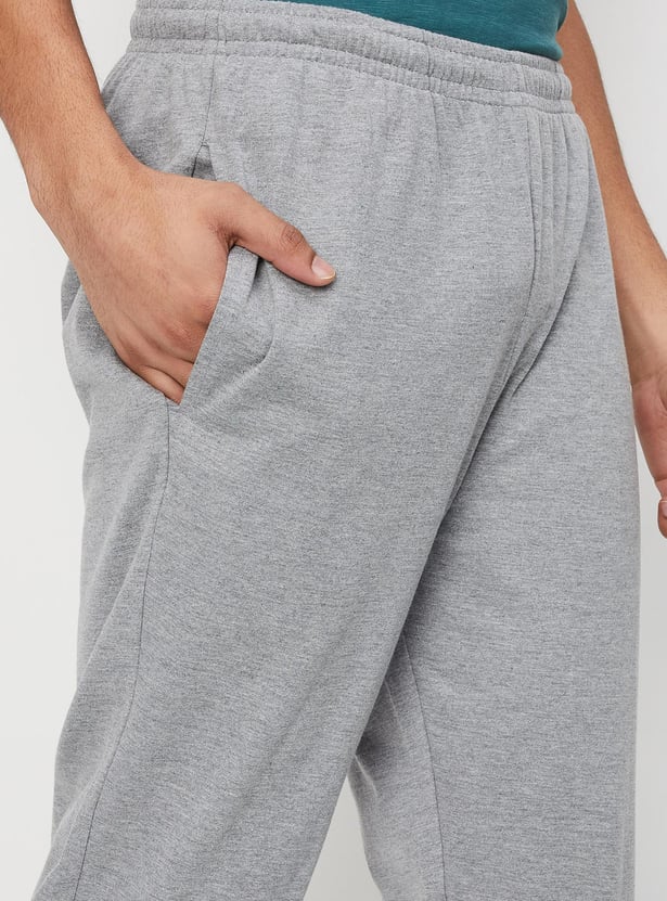 Men Solid Elasticated Track Pants