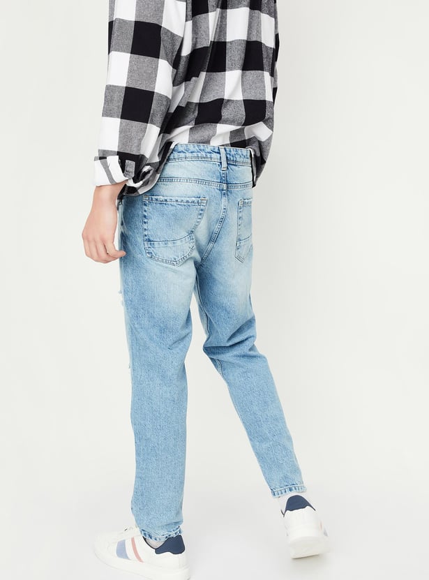 Buy Men Relaxed Fit Distressed Jeans Online at just Rs. 1499.0