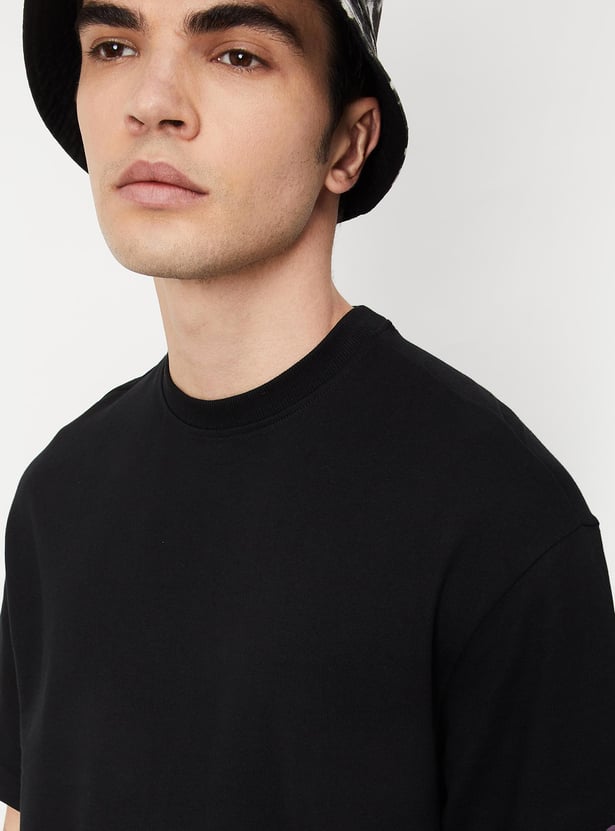 Buy Men Solid Oversized T-shirt Online at just