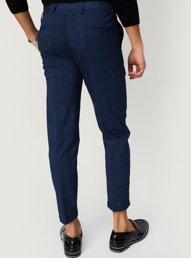 Buy Men Carrot Fit Checked Formal Trousers Online at just Rs. 1299.0 ...