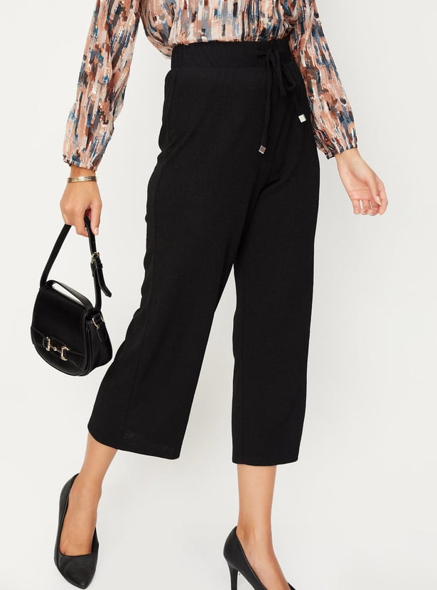 Women Textured Knit Flared Trousers