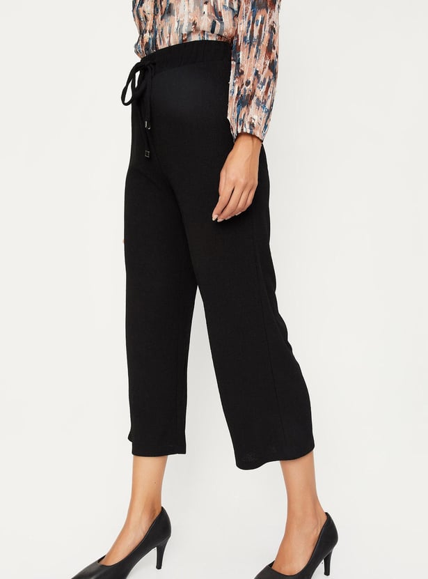 Women Textured Knit Flared Trousers