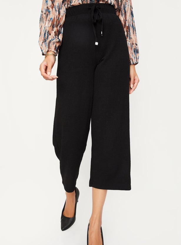 Women Textured Knit Flared Trousers