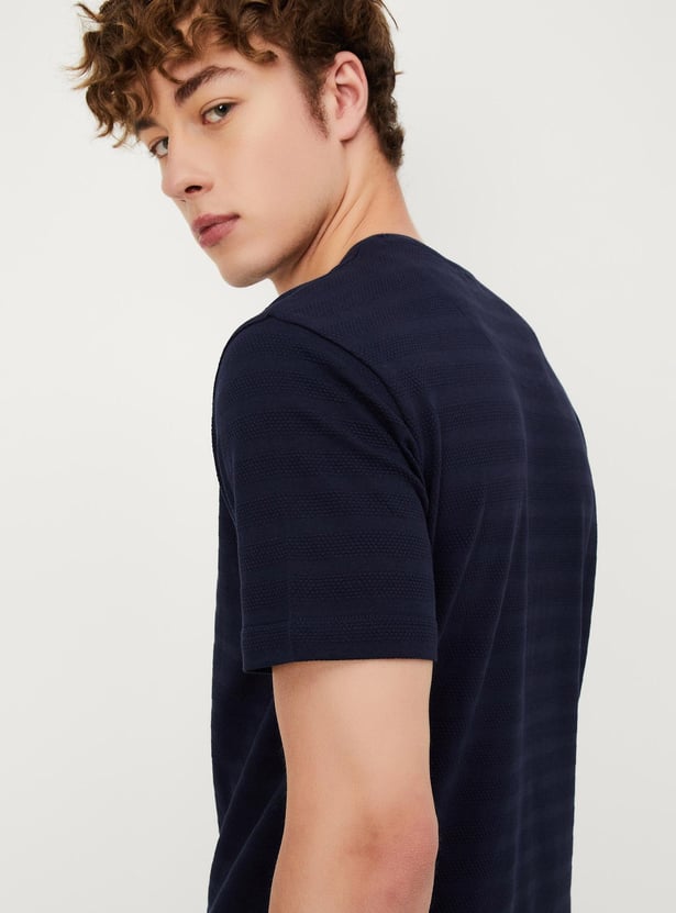 Buy Men Textured Slim Fit T-shirt Online at just