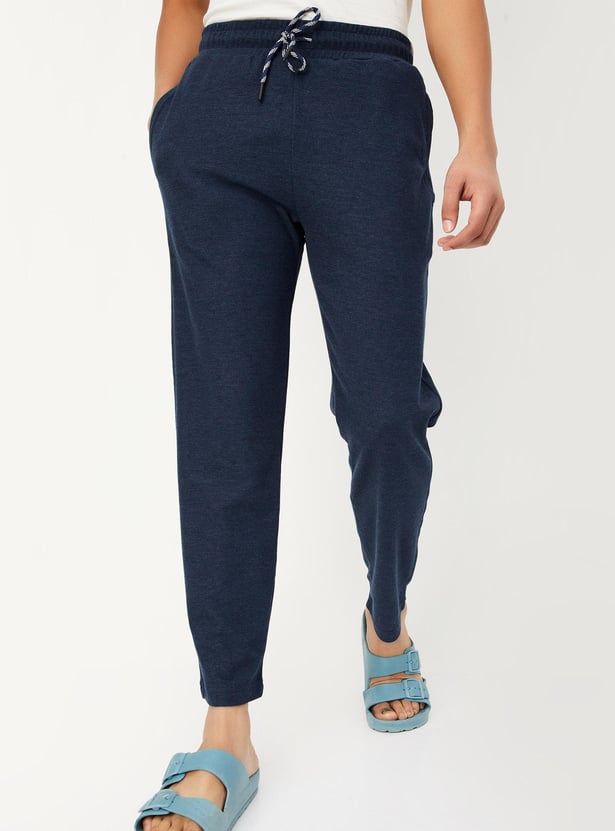 Buy Men Waffle Knit Track Pants Online at just Rs. 699.0