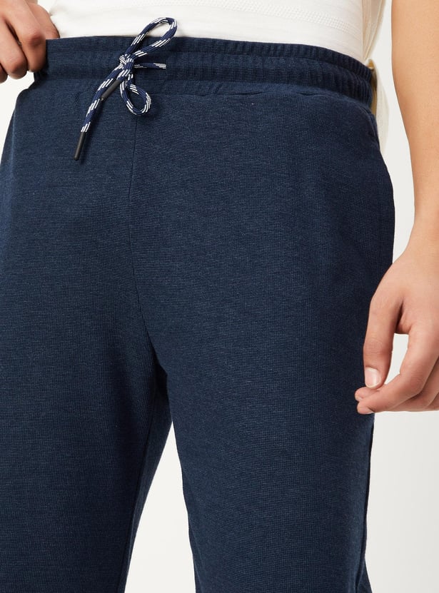 Buy Men Waffle Knit Track Pants Online at just Rs. 699.0