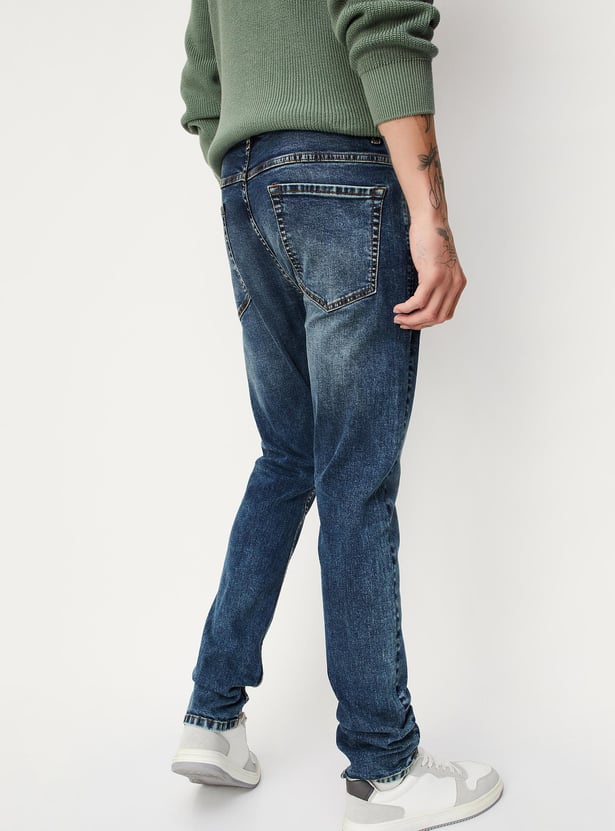 Men Carrot Fit Washed Jeans